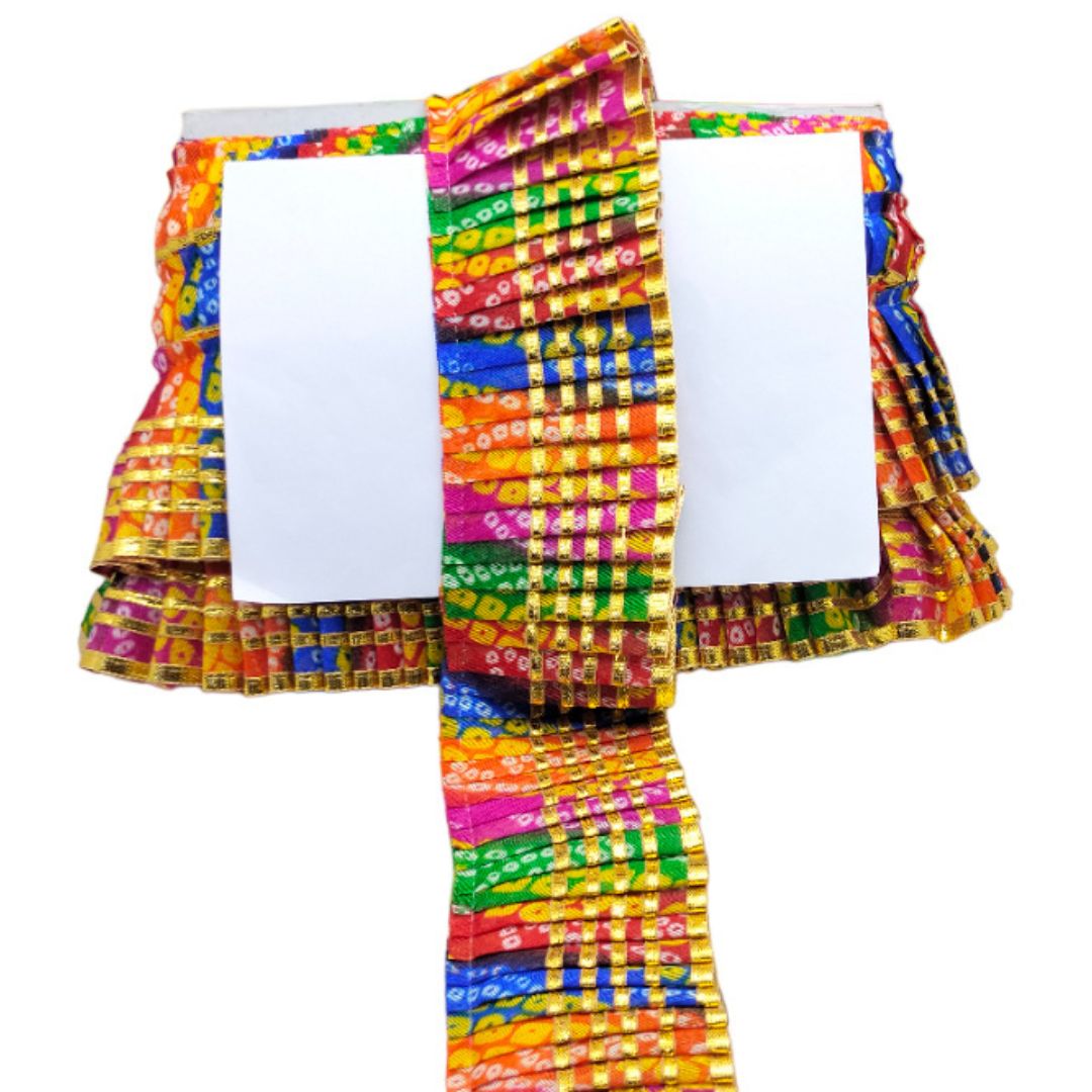 Colorful patterned fabric with a white center on a white background